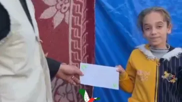 فريق غزة 48 الخيري أثناء توزيع المساعدات على الأسر المحتاجة وكفالة الأيتام في غزة.